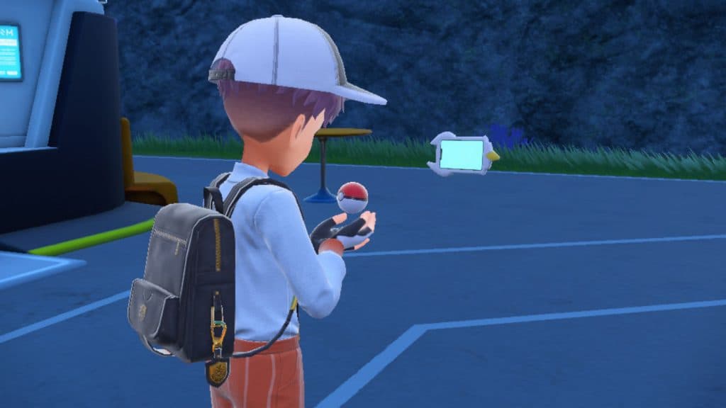 A trainer using trade codes to swap Pokemon