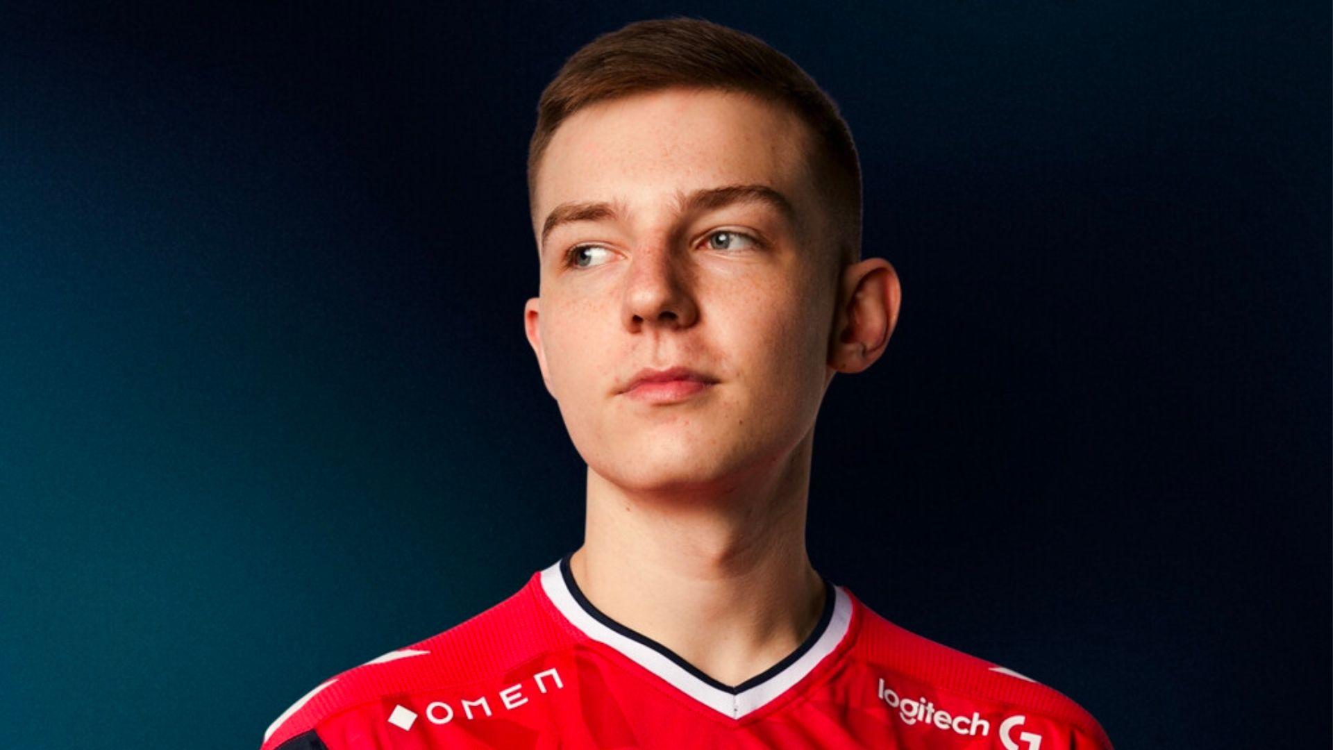 Buzz in red Astralis jersey on blue background