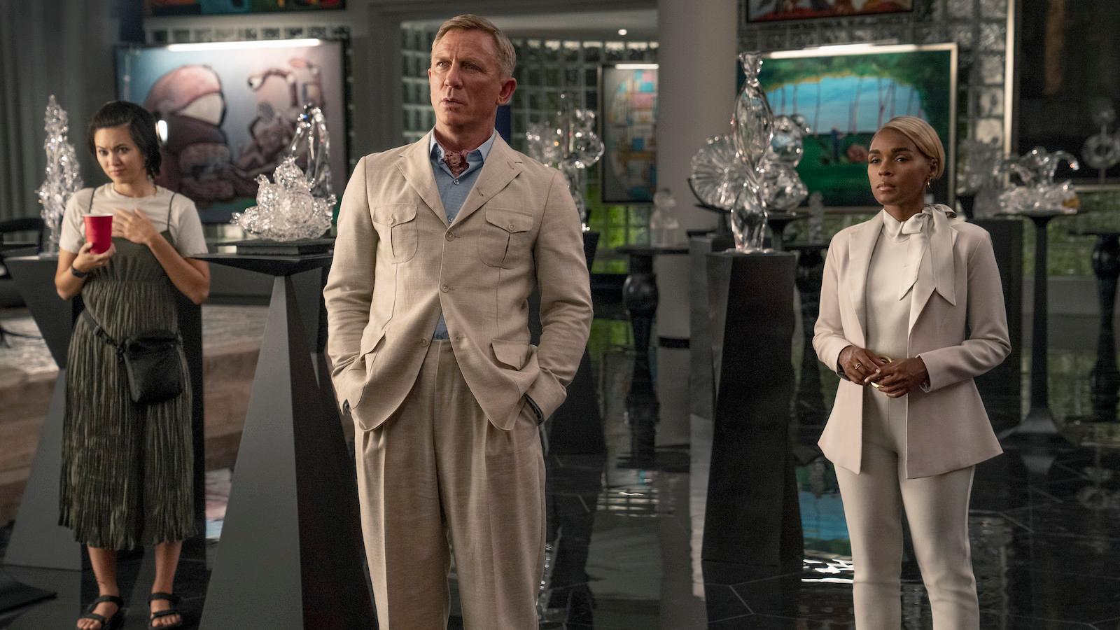 Jessica Henwick as Peg, Daniel Craig as Detective Benoit Blanc and Janelle Monáe as Andi in Glass Onion Knives Out on Netflix