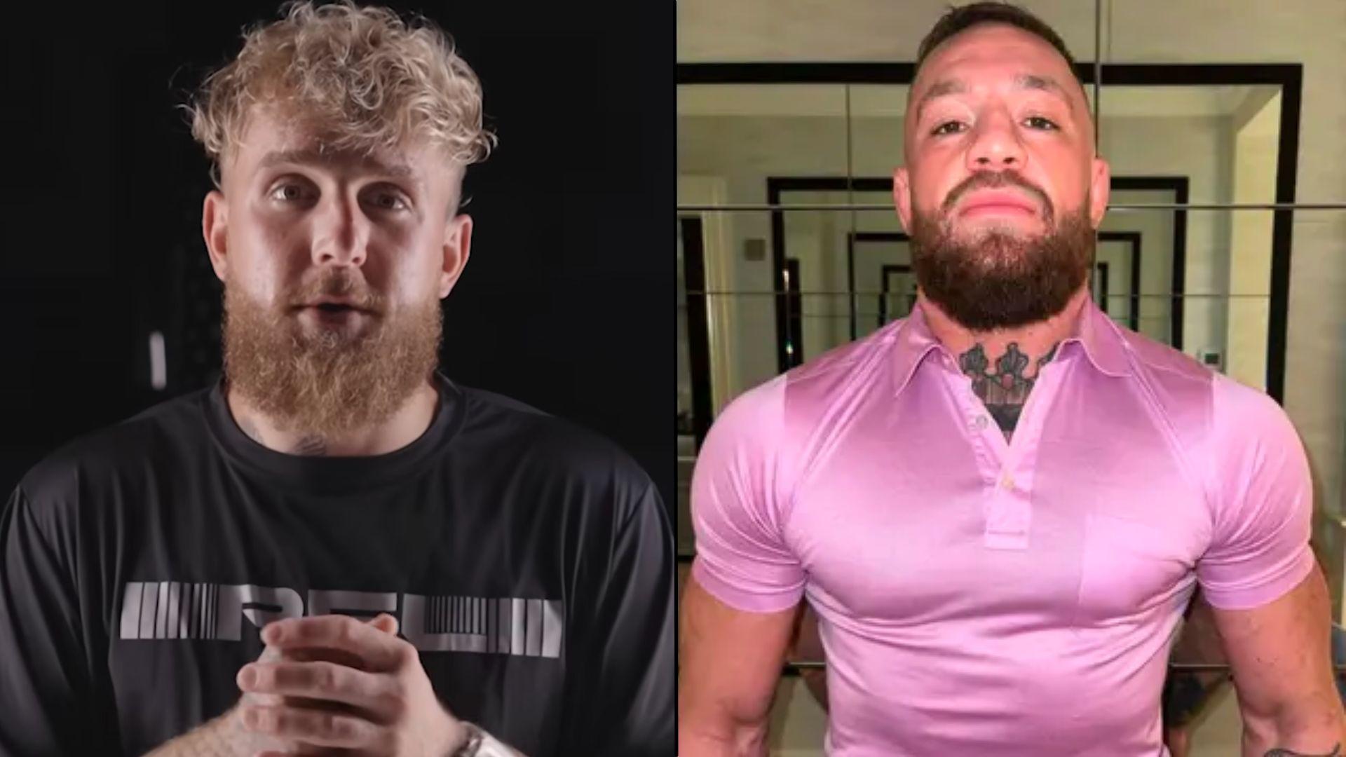 Jake Paul sitting in black shirt next to Conor McGregor standing in pink shirt