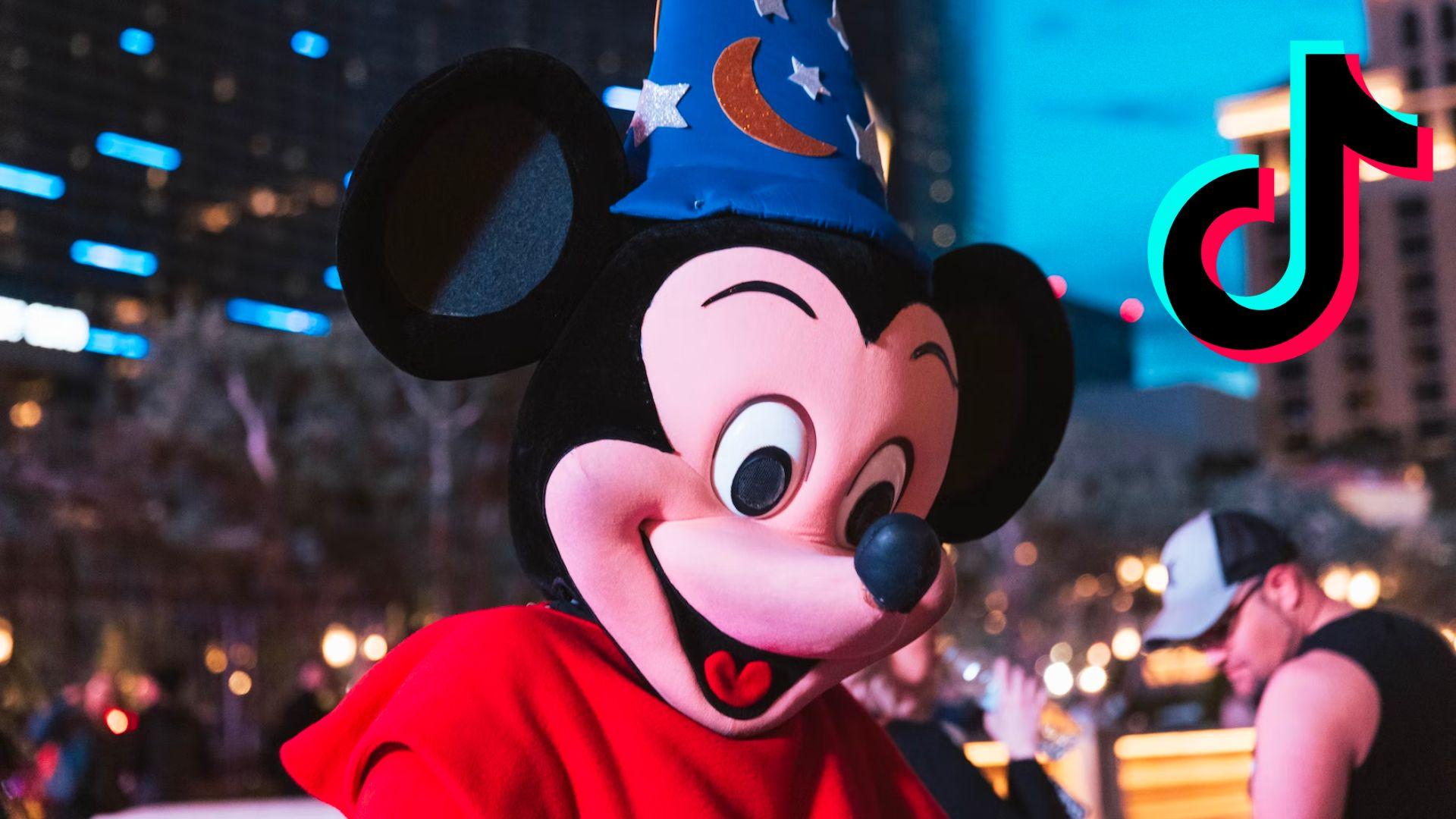 Mickey Mouse in red jacket next to TiKTok logo