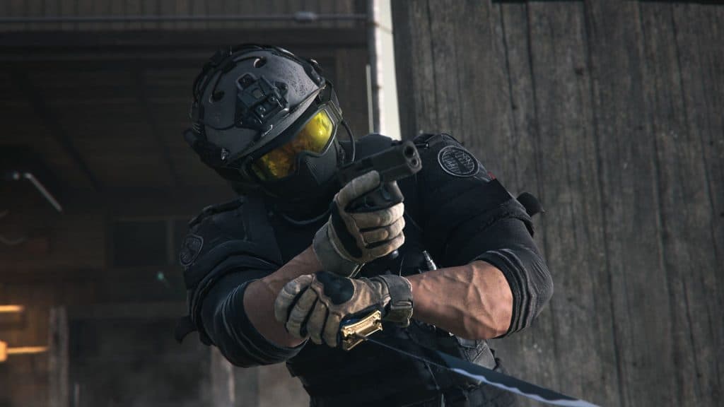 cod warzone 2 operator holding knife and gun