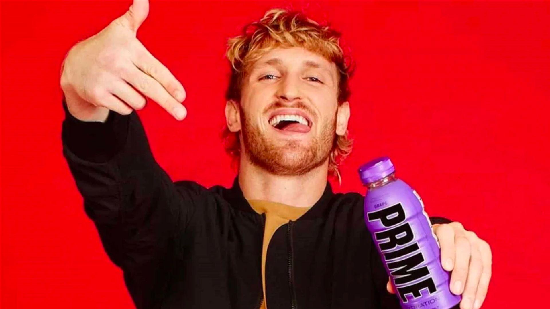 Logan Paul with purple bottle of prime