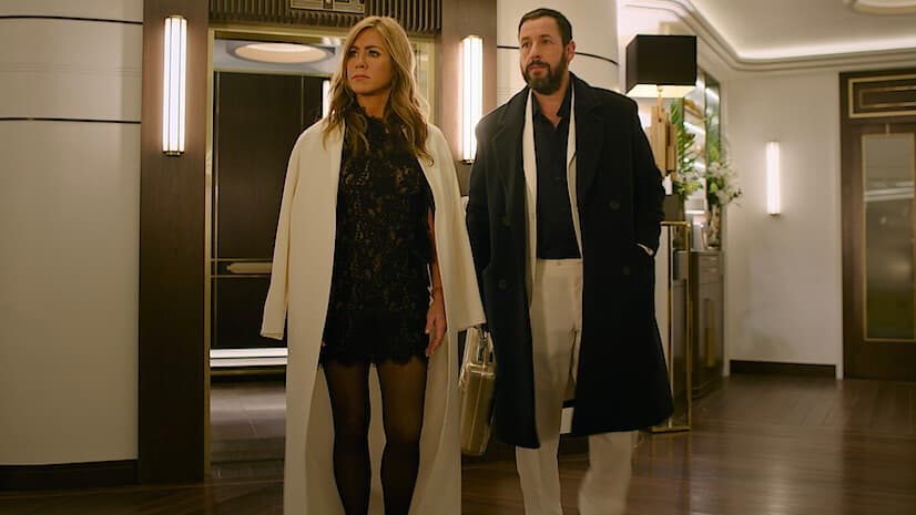 Jennifer Aniston and Adam Sandler in a restaurant in Murder Mystery 2.