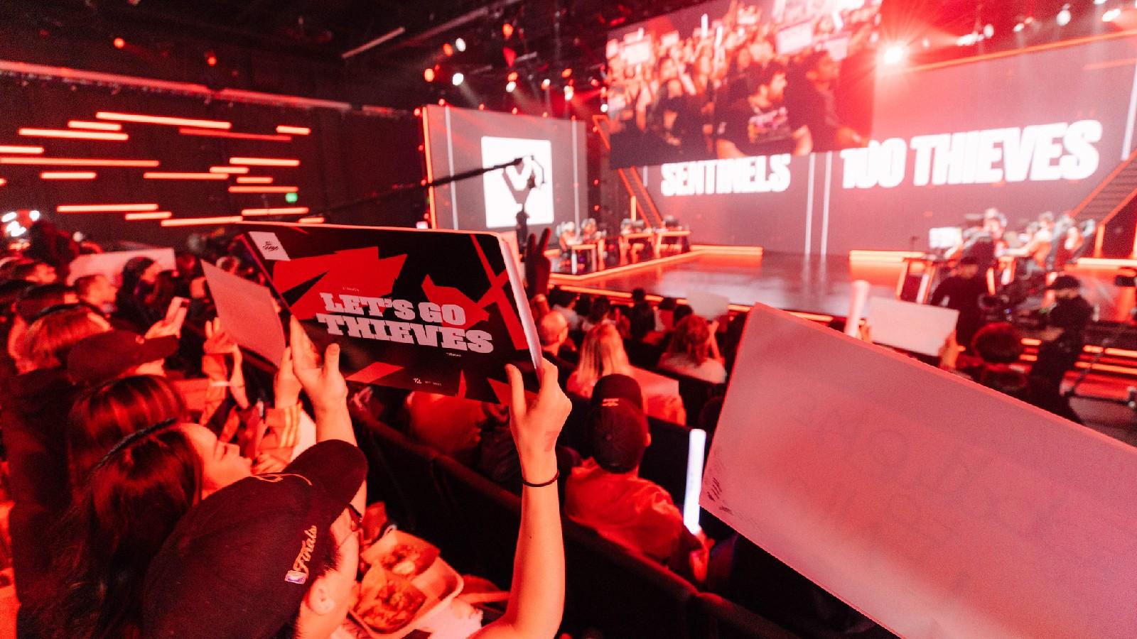 Fan with a 100Thieves sign at VCT Americas