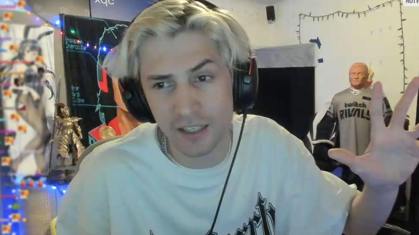 xQc wearing white sweater and gaming headset