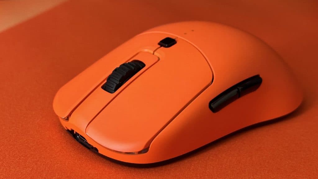 Vaxee XE Wireless mouse on an Orange mousepad