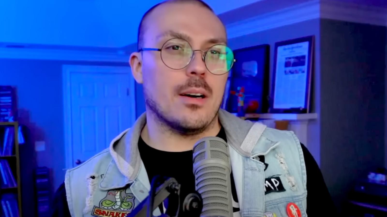 Anthony Fantano talking into the microphone