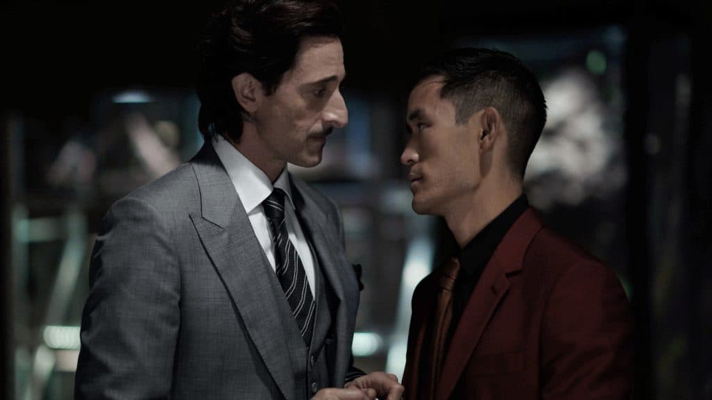 Adrien Brody as Leveque and Mike Moh as Wagner in Ghosted