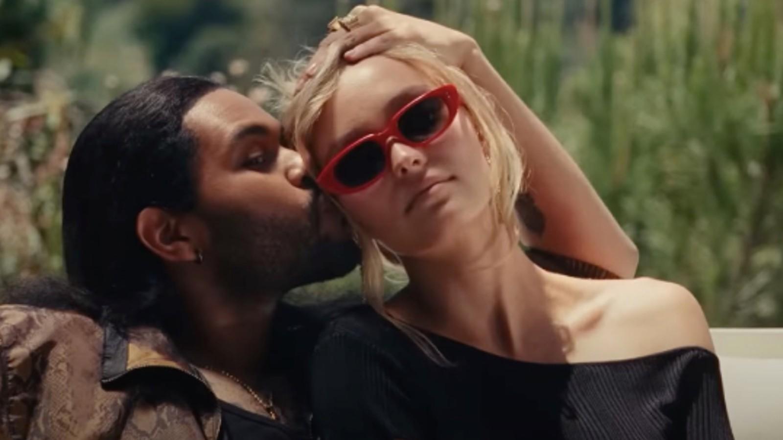 The Weeknd kisses Lily Rose-Depp's cheek in The Idol