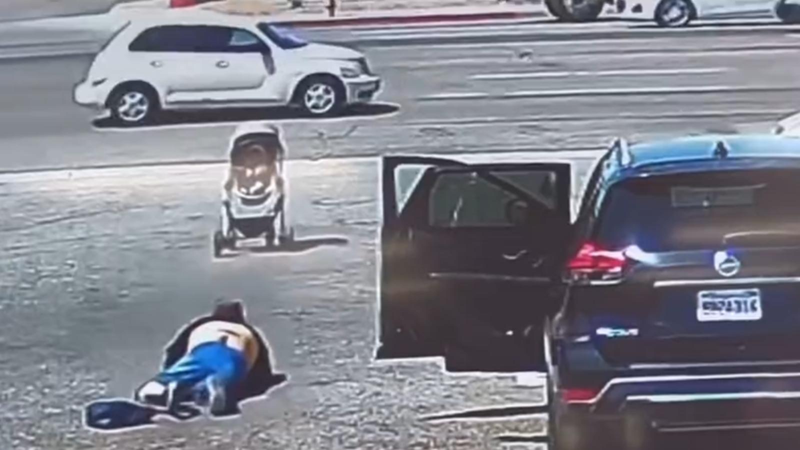 Hero saves baby from rolling into traffic