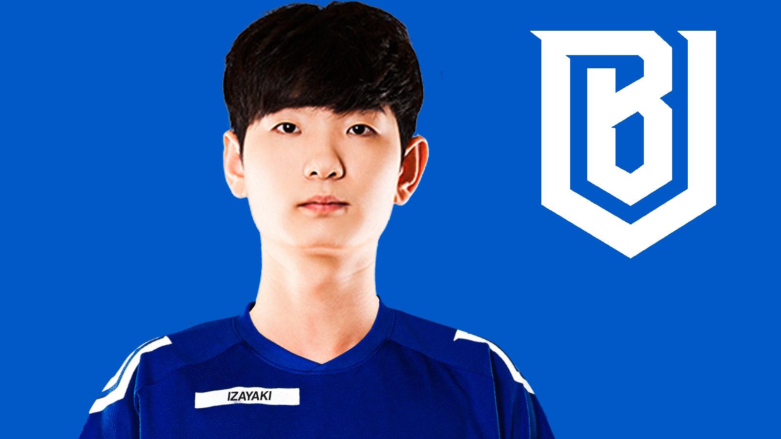 IZaYaki posing in Boston Uprising jersey with team logo and colors in background.