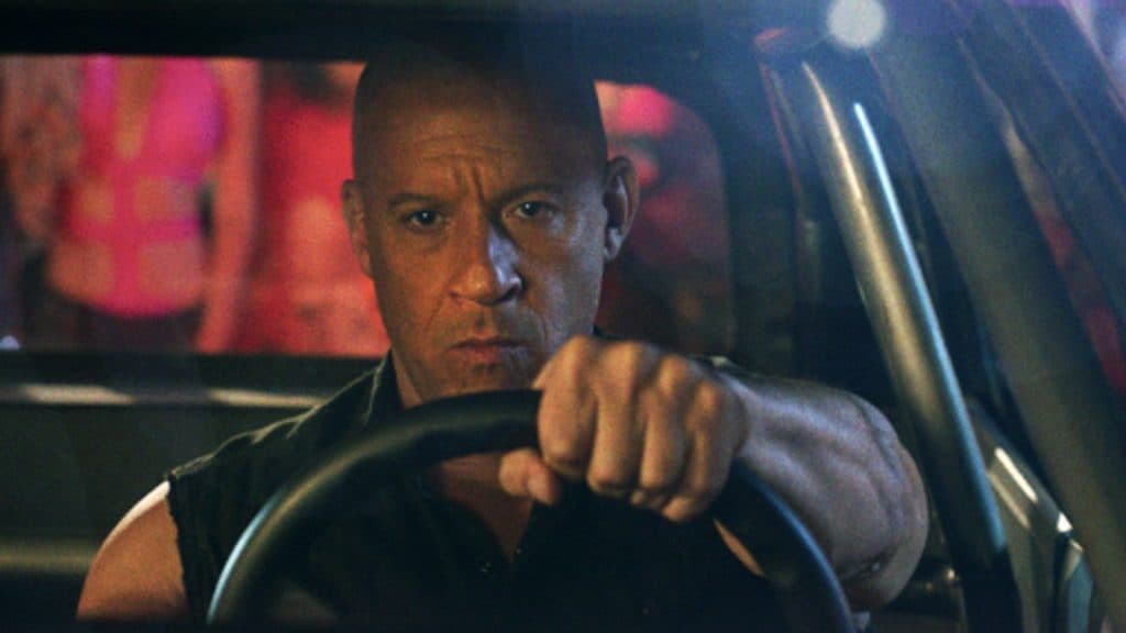 A close up of Dom Toretto driving in Fast X