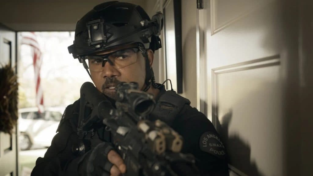 Shemar Moore as Daniel Harrelson wears SWAT gear and holds a gun in the show SWAT