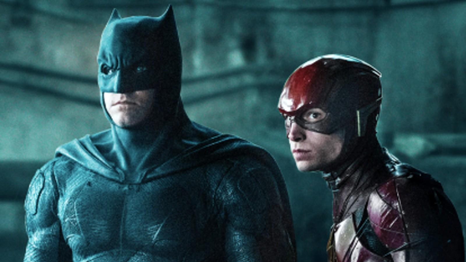 Batman stands next to The Flash in Justice League