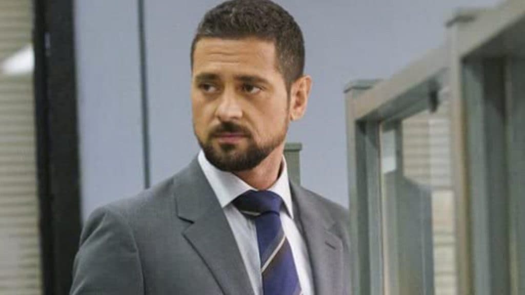 Jared Vasquez wears a suit in the show Manifest