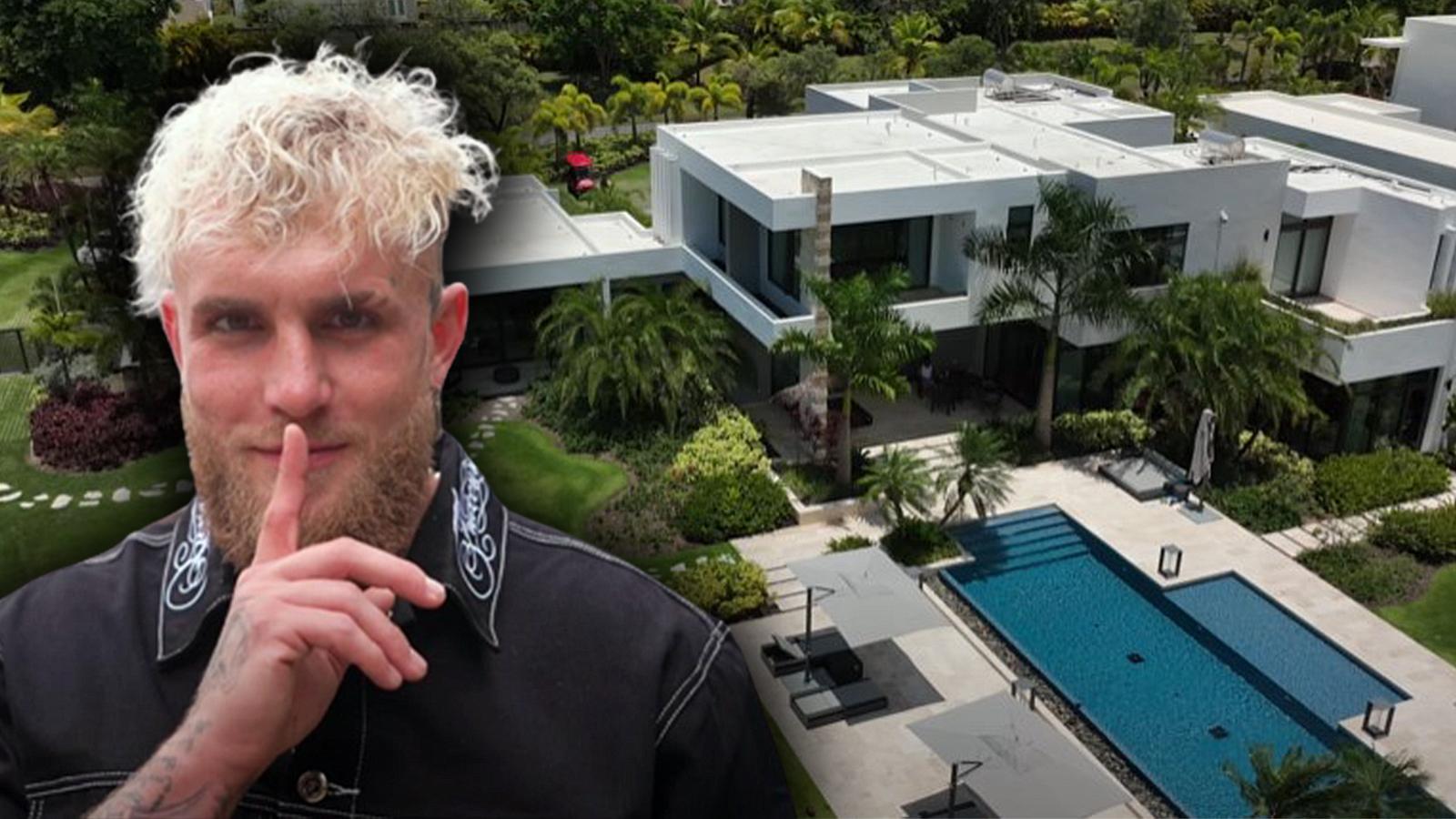 Jake Paul poses in front of his massive mansion in Puerto Rico.