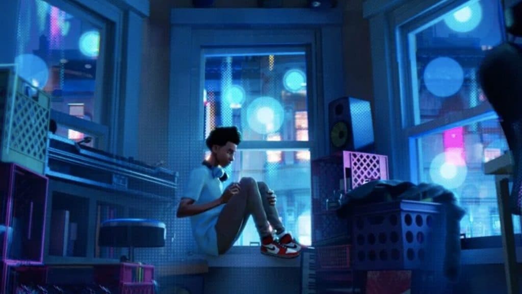 Miles Morales sits in his bedroom in the short film The Spider Within: A Spider-Verse Story