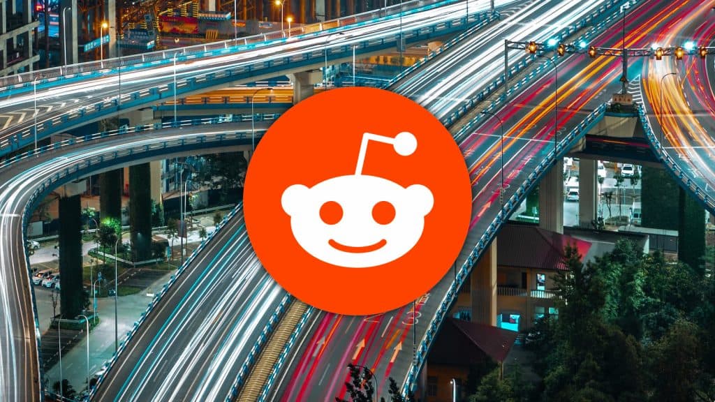 Reddit logo with traffic behind it
