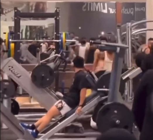 Gym user watches brawl