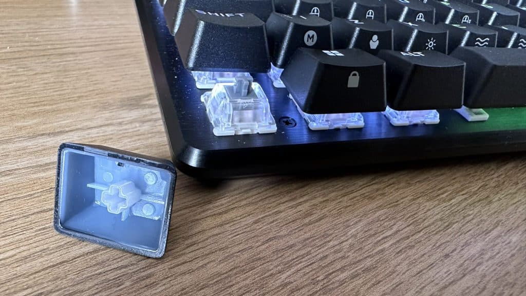 Corsair K65 Pro Mini keycaps and switch with RGB on a desk