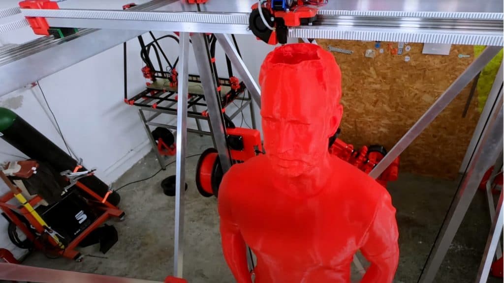3D printed clone with scalp being printed in a workshop
