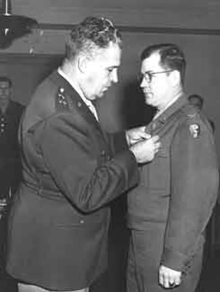 General Leslie Groves awarding Colonel John Landsdale the Legion of Merit