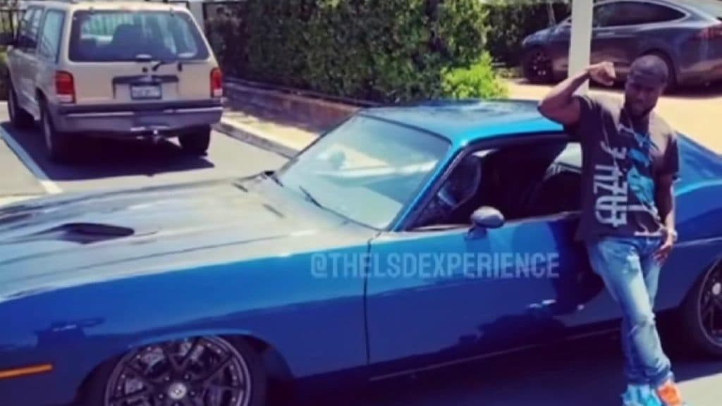 Kevin Hart and his 1970 Plymouth Barracuda before his 2019 car wreck.