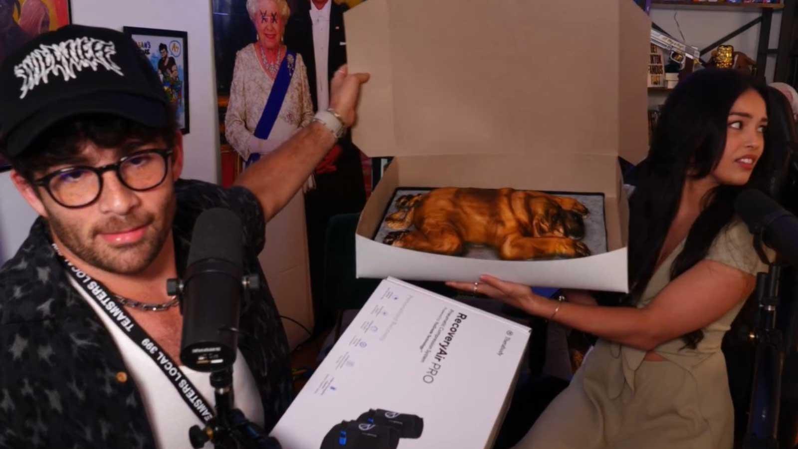 Hasan showing cake of his dog Kaya gifted by Valkyrae to stream.