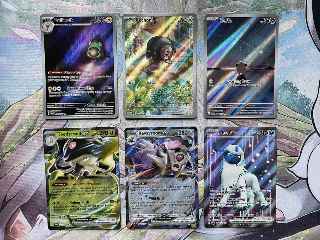 A photo of six cards from the Pokemon TCG Obsidian Flames expansion