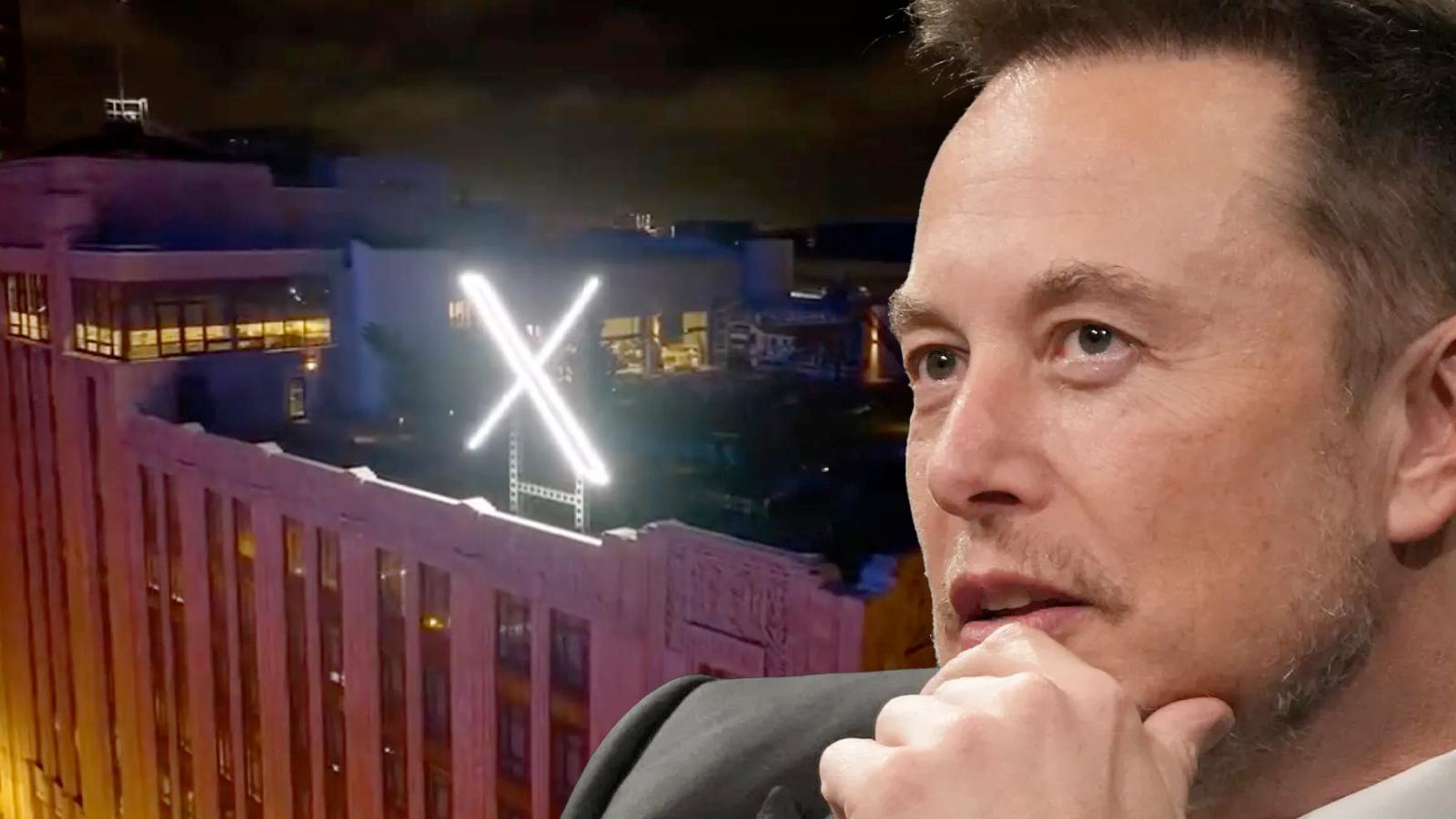 elon musk in front of his x sign