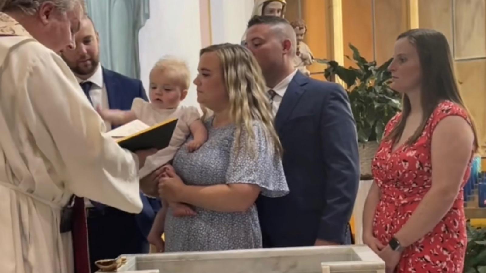 A mom and her baby go viral for a hilarious baptism moment.