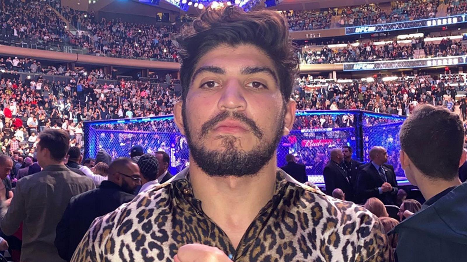 Dillon Danis wearing leopard print shirt at UFC event