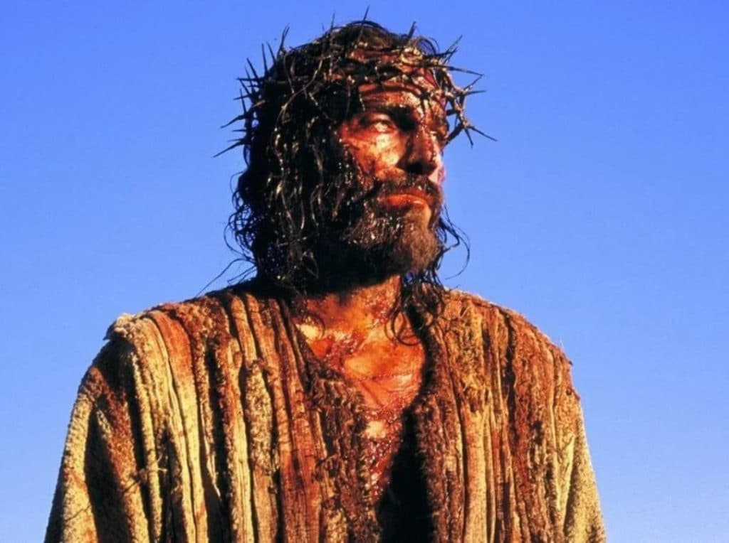 Jim Caviezel in The Passion of the Christ, one of the highest-grossing R-rated movies of all time