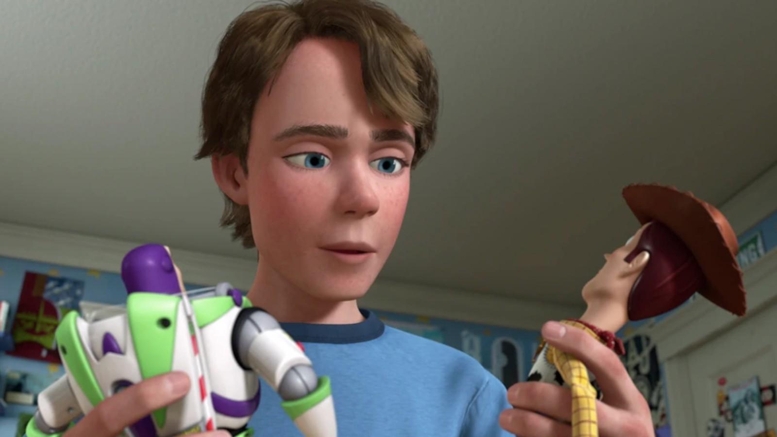 Andy holds Woody and Buzz Lightyear in Toy Story 4