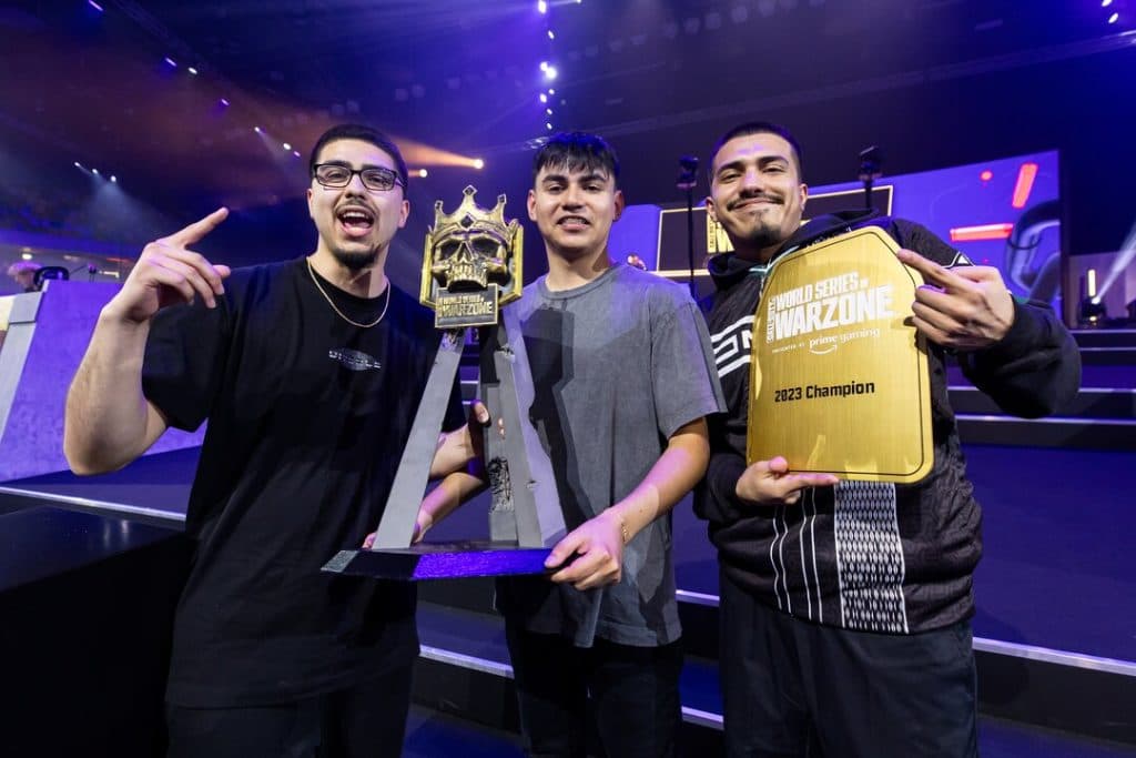 Shifty, Biffle, and Sage holding trophy after winning World Series of Warzone trios tournament