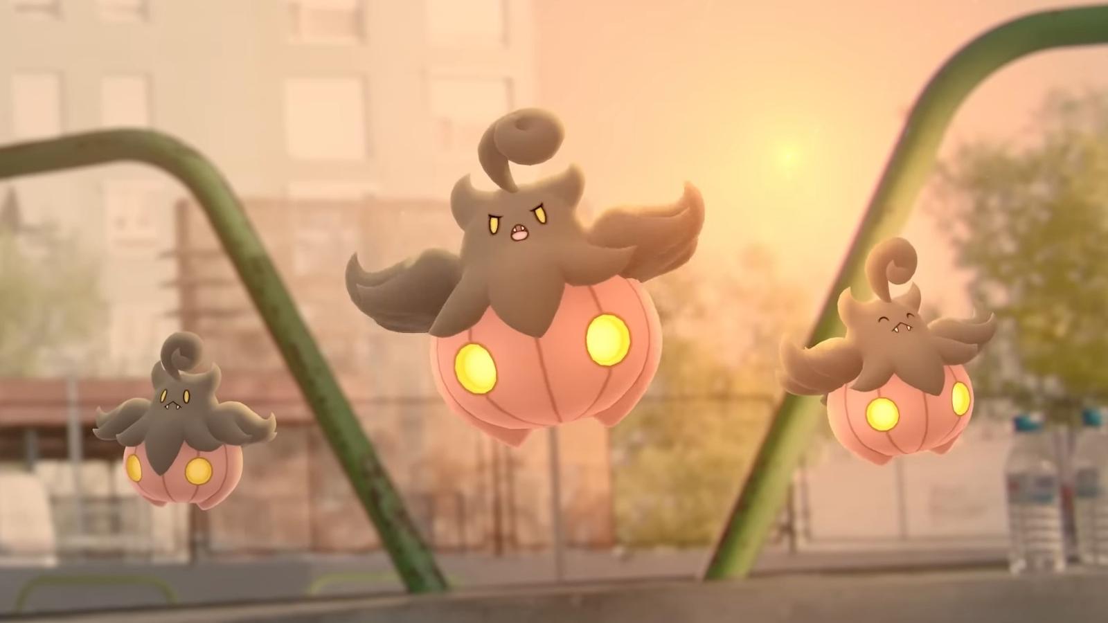 Three Pumpkaboos exploring neighborhood in Pokemon Go.