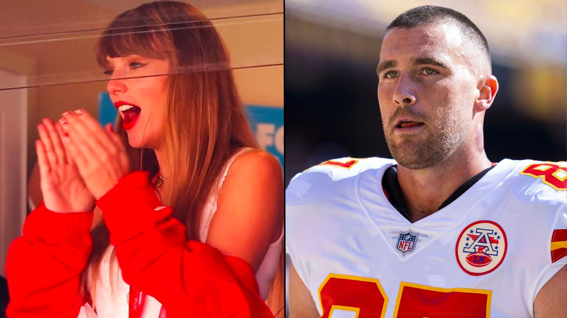 Taylor Swift clapping in red jacket side-by-side with Travis Kelce