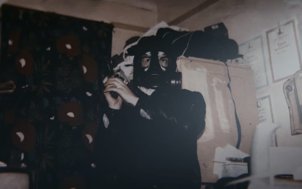 Police evidence showing Barry George holding a gun and wearing a gas mask