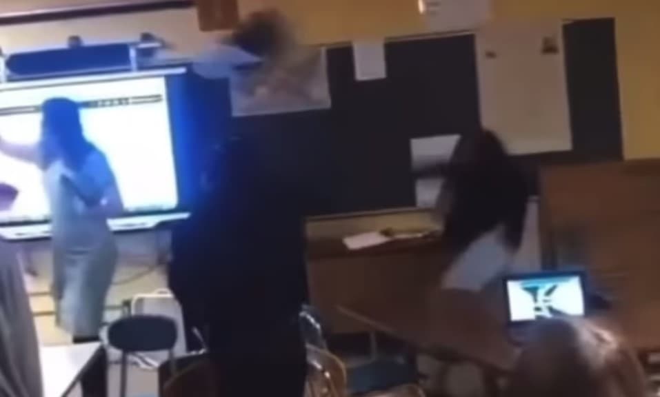 Student throws chair at teacher
