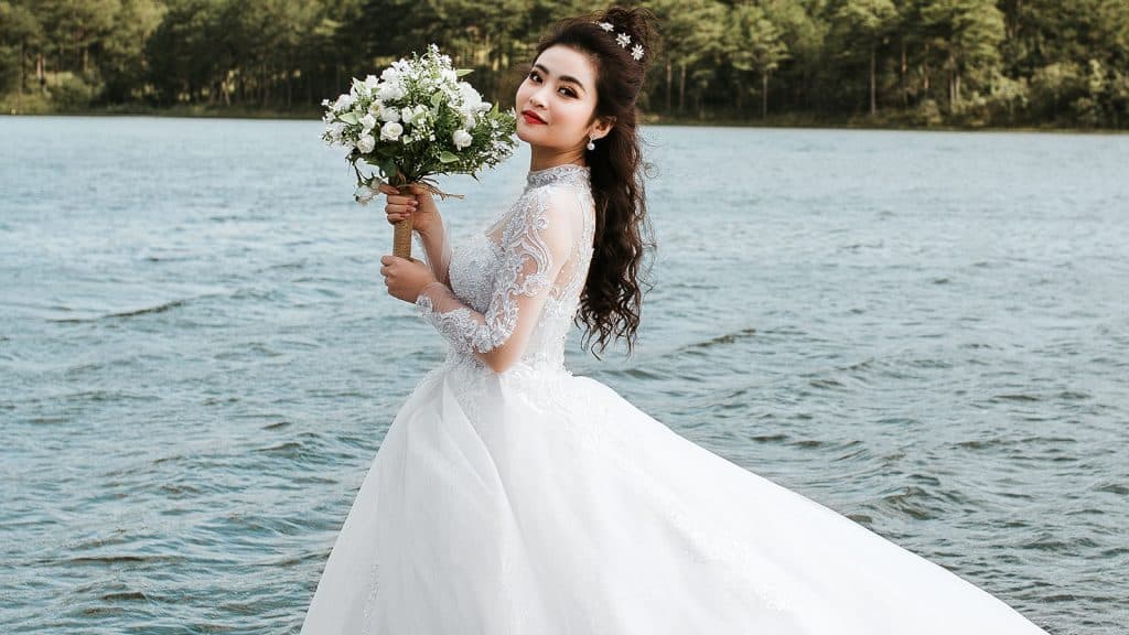 Woman wearing a white wedding gown.