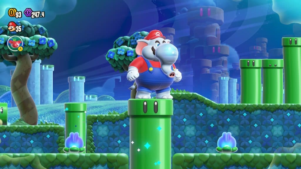 Elephant Mario on top of a pipe in Mario Wonder