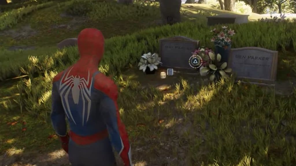 An image of Peter Parker at Aunt May's grave in Marvel's Spider-Man 2.