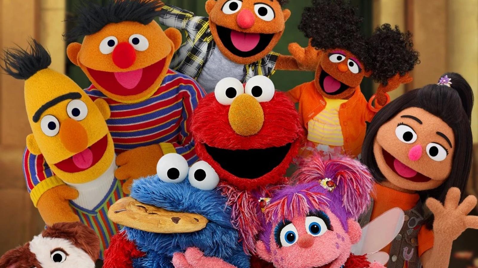 Elmo, Cookie Monster, and the characters of Sesame Street