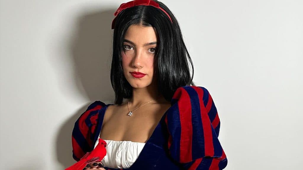 An image of Charli D'Amelio wearing a Snow White costume.