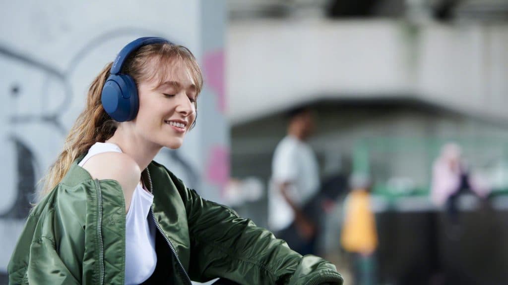 Girl wearing XB-910N sony headphones