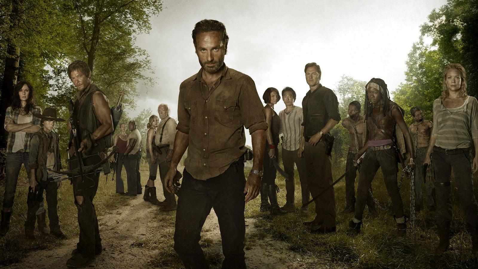 A Walking Dead promotional still featuring the full cast.