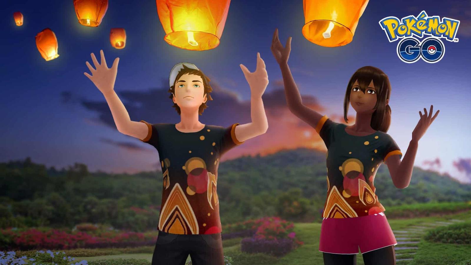 Two trainers wearing Pokemon Go Festival of Lights 2023 shirts