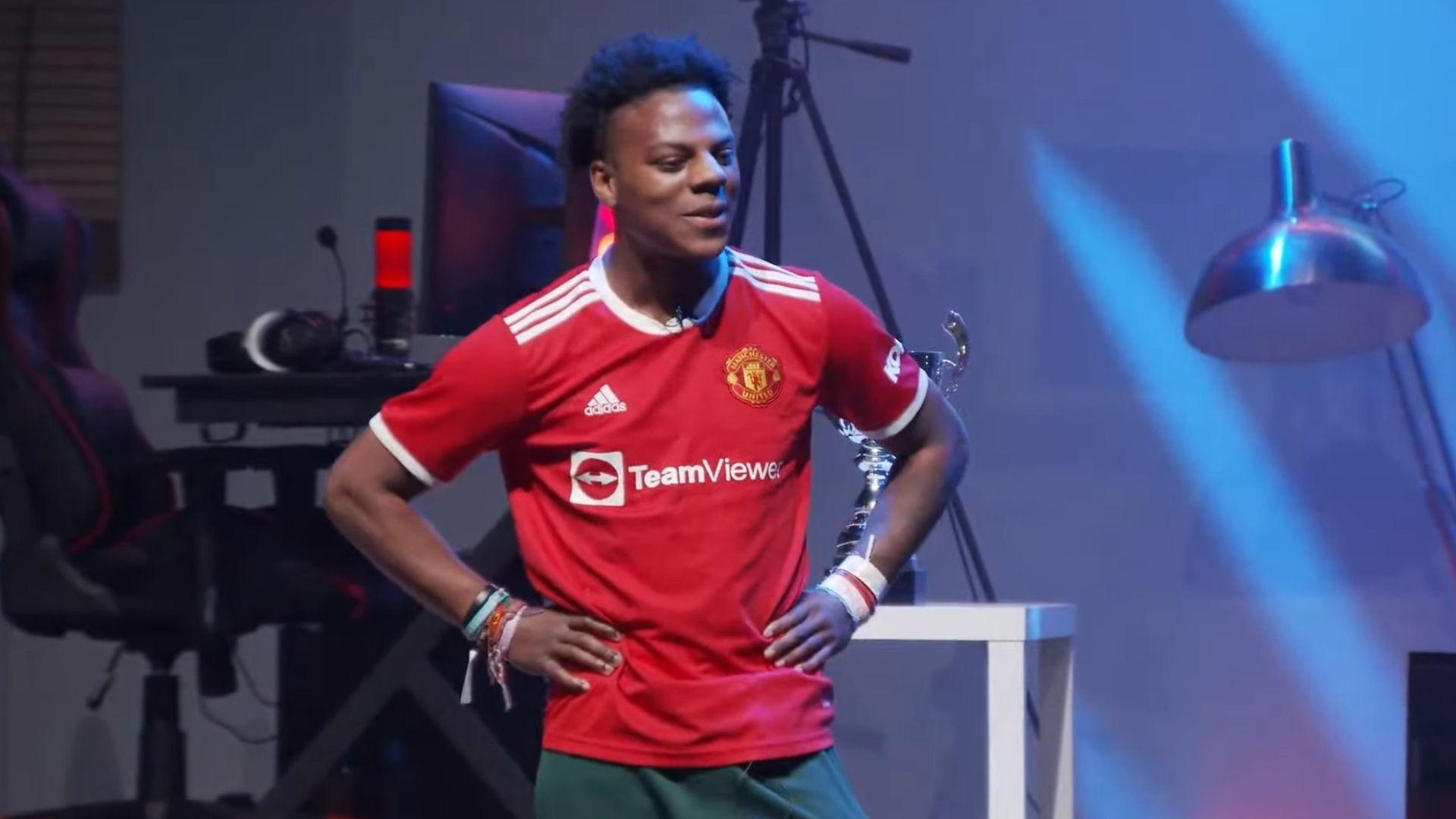 IShowSpeed wearing Manchester United shirt with hands on his hips