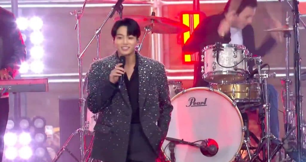 BTS singer Jungkook performs onstage in a concert